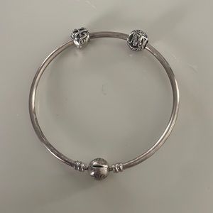 Pandora Clasp Bangle Bracelet with two charms- M and nurse charm.